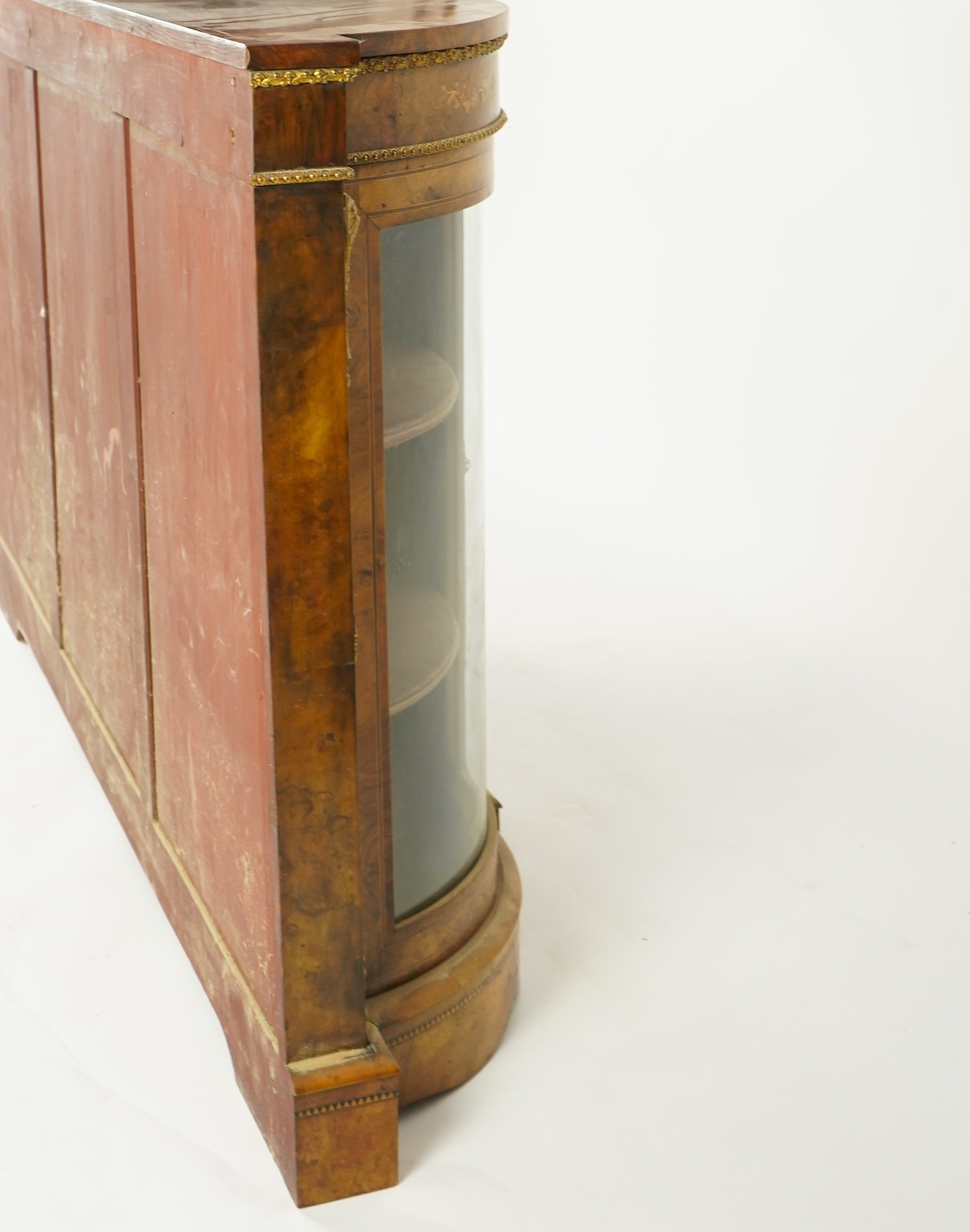 A Victorian marquetry inlaid, gilt metal mounted bowfront side cabinet